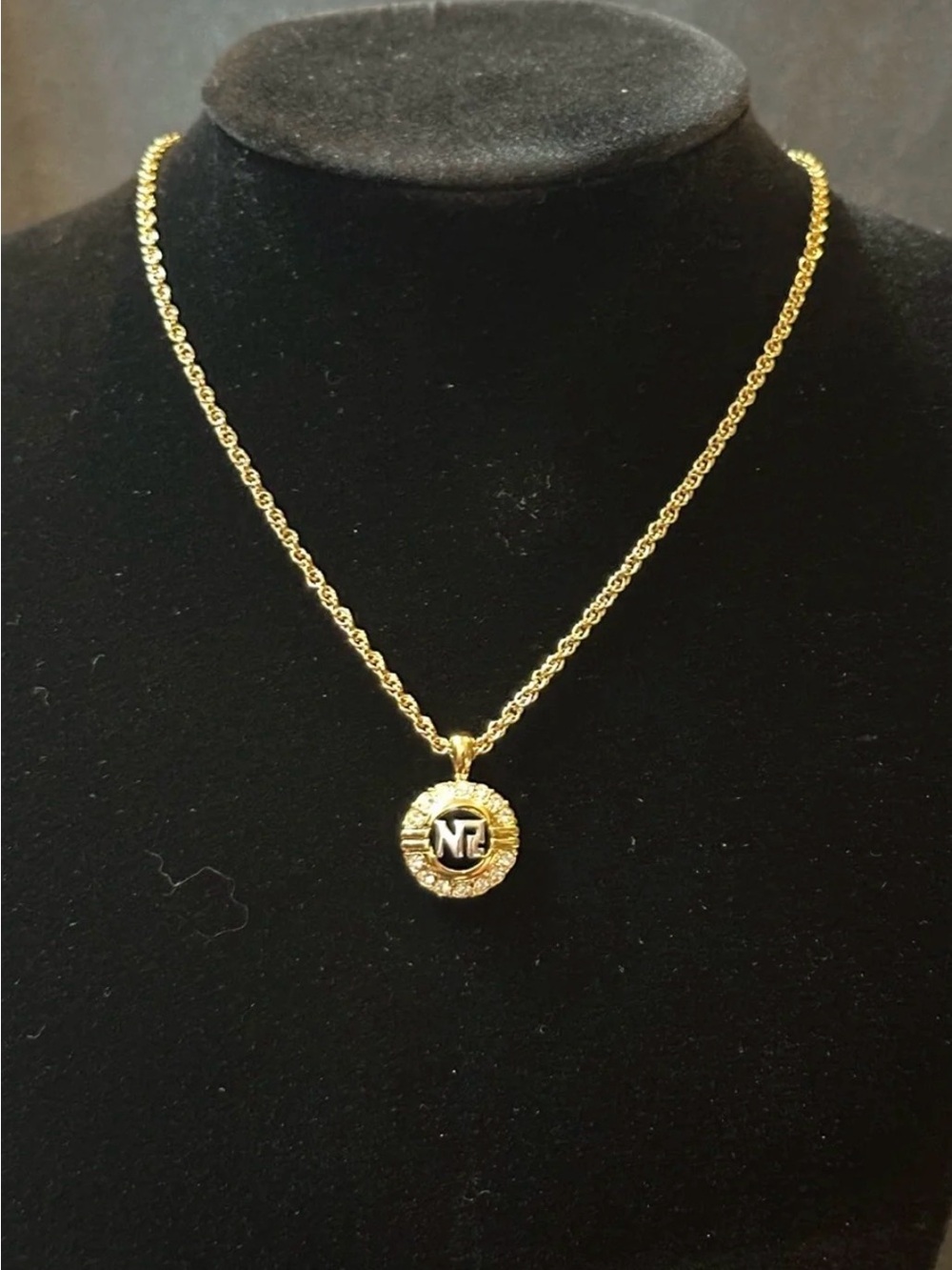 Nina Ricci Gold Tone Rope Chain Necklace Signed Adjustable Crystal Logo Charm